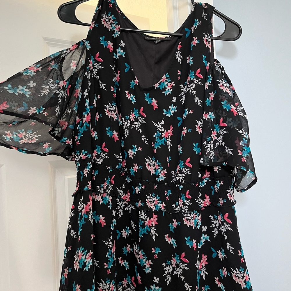 Floral Black peplum style top with Sheer Sleeves